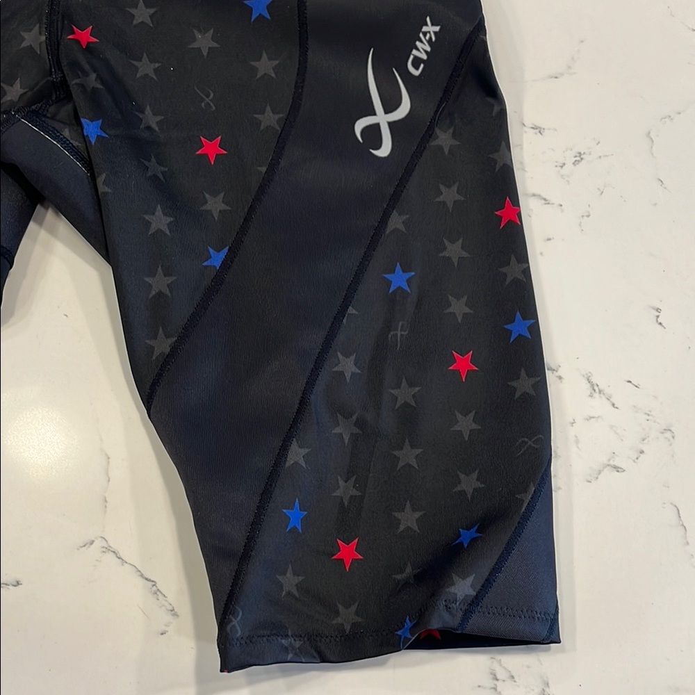 CW-X Men's Black Compression Shorts with Red & Blue Star Accents - Picture 2 of 10